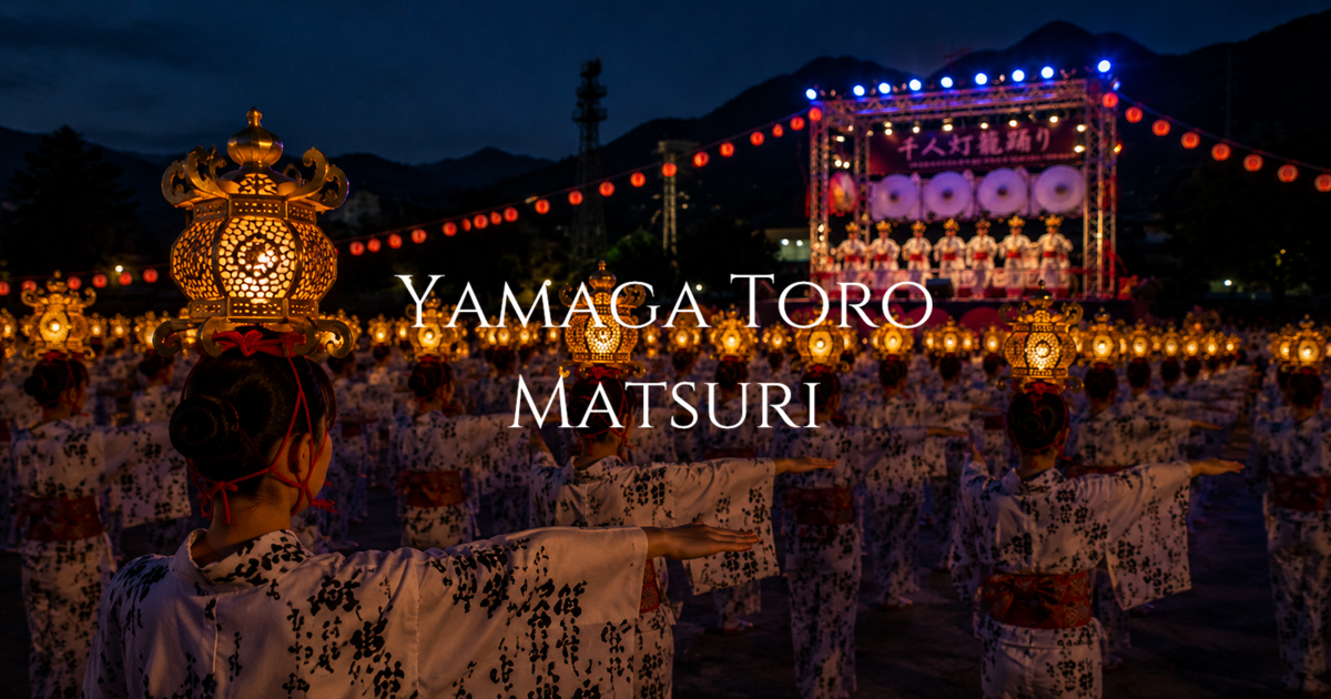 Women in white yukata perform a nighttime lantern dance before an illuminated festival stage, carrying glowing golden lanterns on their heads.